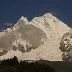 On the left is Dhaulagiri, seventh highest mountain in the world. On the right is Tukuche Peak.