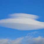 Lenticular cloud forming at the end of the valley - people have actually mistaken these for ufos!