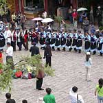 Naxi women - the ethnic minority of Lijiang - demonstrate their traditional dances