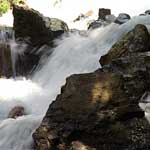 Waterfall to the quiet lake